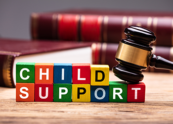 Child Support spelled out in childrens' blocks 