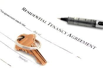 Residential Tenancy Agreement with keys on it