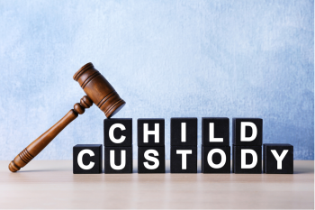 Child custody spelled out in blocks with a gavel